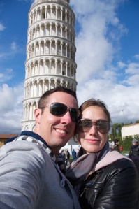 My wife and I during our travels.  We swear we didn't take a photo trying to hold up the tower.